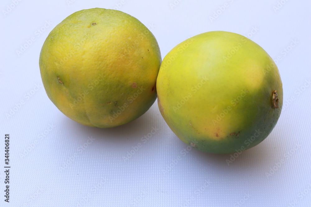 Yellow and green color whole ripe Sweet lime fruits or Citrus limetta Yellow and green color whole ripe Sweet lime fruits or Citrus limetta