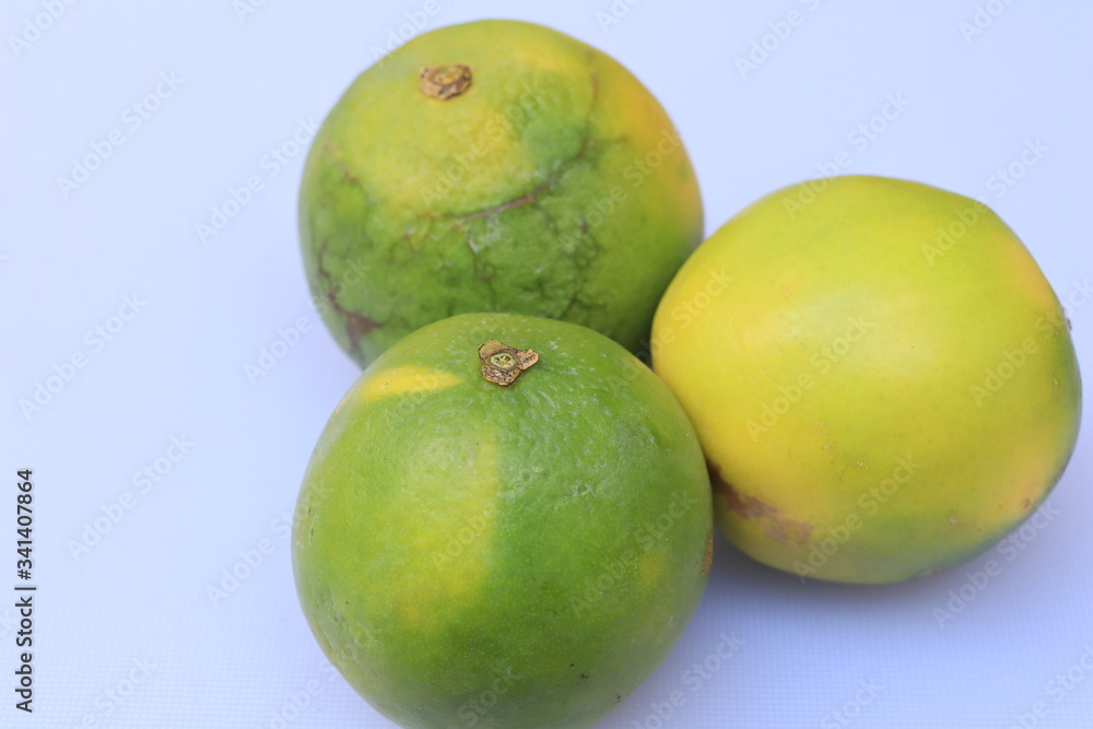 Yellow and green color whole ripe Sweet lime fruits or Citrus limetta Yellow and green color whole ripe Sweet lime fruits or Citrus limetta