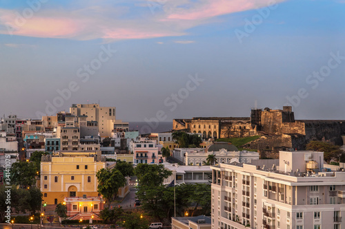 Old San Juan, Puerto Rico at the sunset. Cruise port. Aerial view from the cruise ship on the fortress San Cristobal and San Felipe del Morro. © shorex.koss