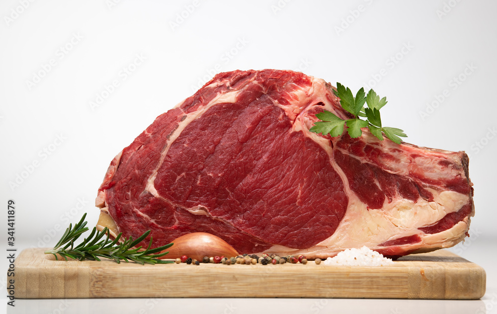 Εκτύπωση καμβά Raw T Bone steak on wooden board prepared to Grill