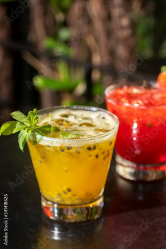 Brazilian caipirinhas of various fruits in glass. Typical drink made of fruits and cachaça drink photo