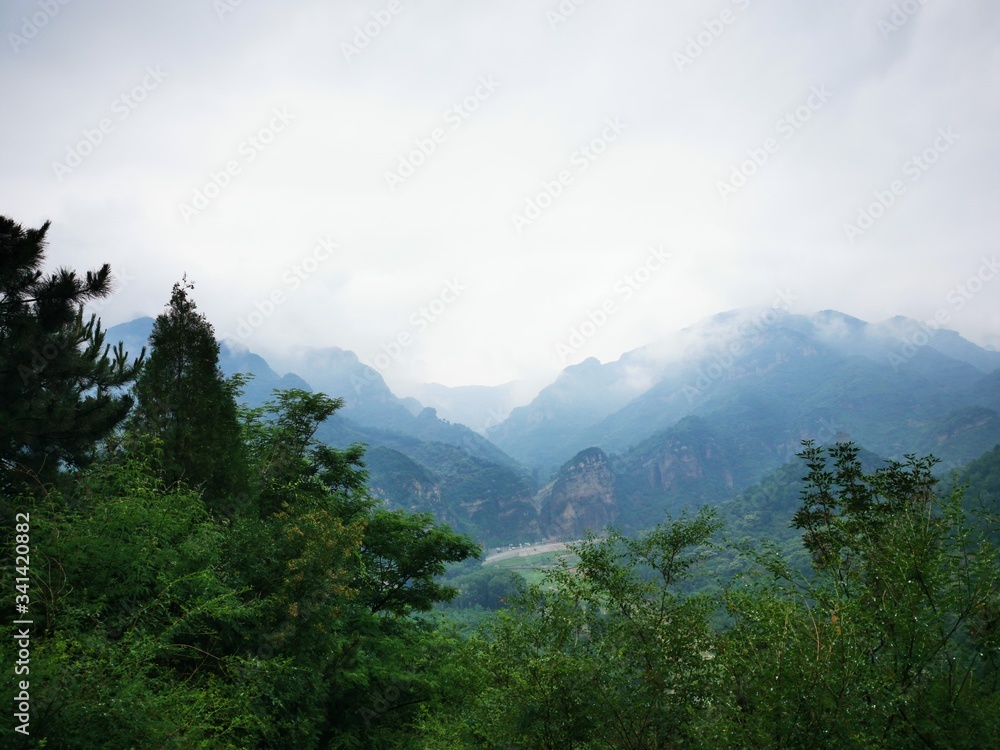 Fototapeta premium clouds over the mountains