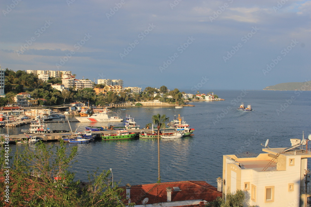 Gulluk, Mugla, TURKEY - 24 April 2017: Amazing view over the pier with fishing boats in a day light.