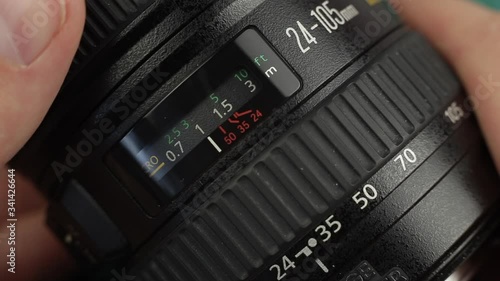 Changing the focal length on the camera's lens. Focus ring close up