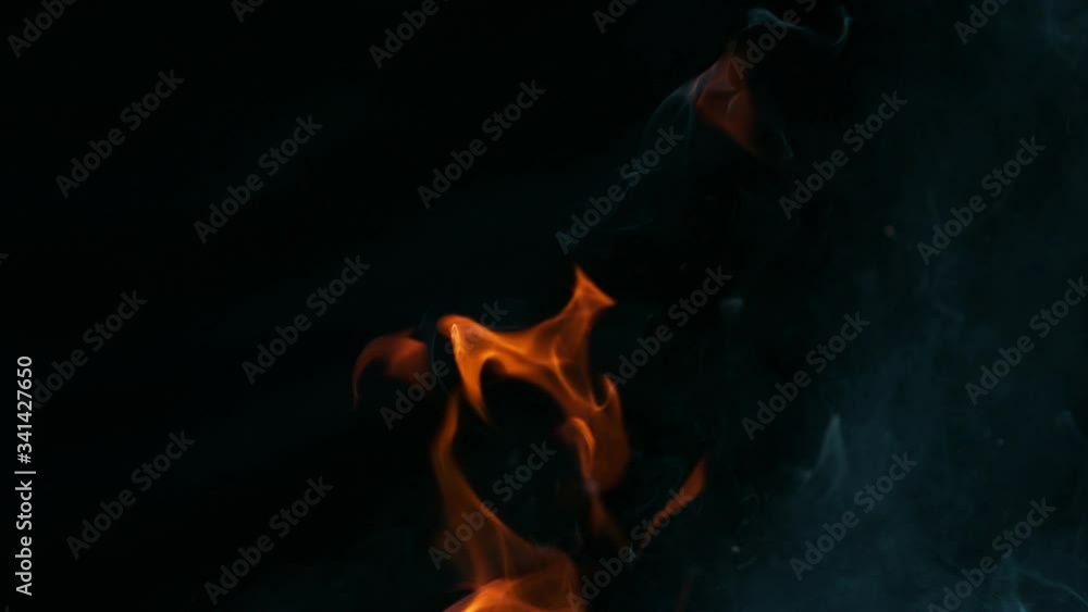 Super slow motion of flames isolated on black background. Filmed on high speed cinema camera, 1000 fps