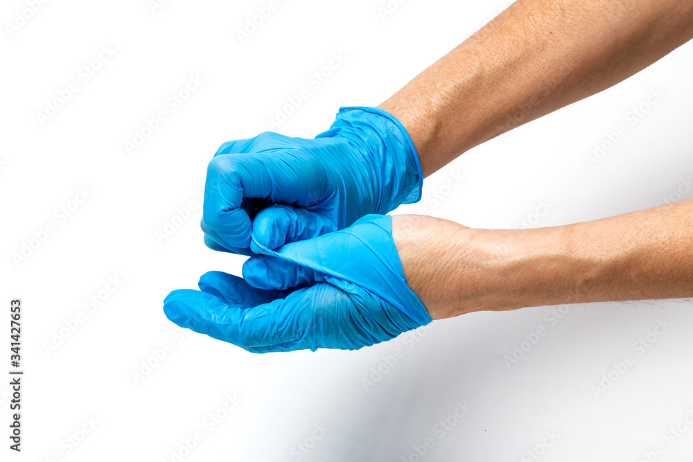 Hands with latex gloves and syringe preparing the coronavirus vaccine Hands with latex gloves and syringe preparing the coronavirus vaccine