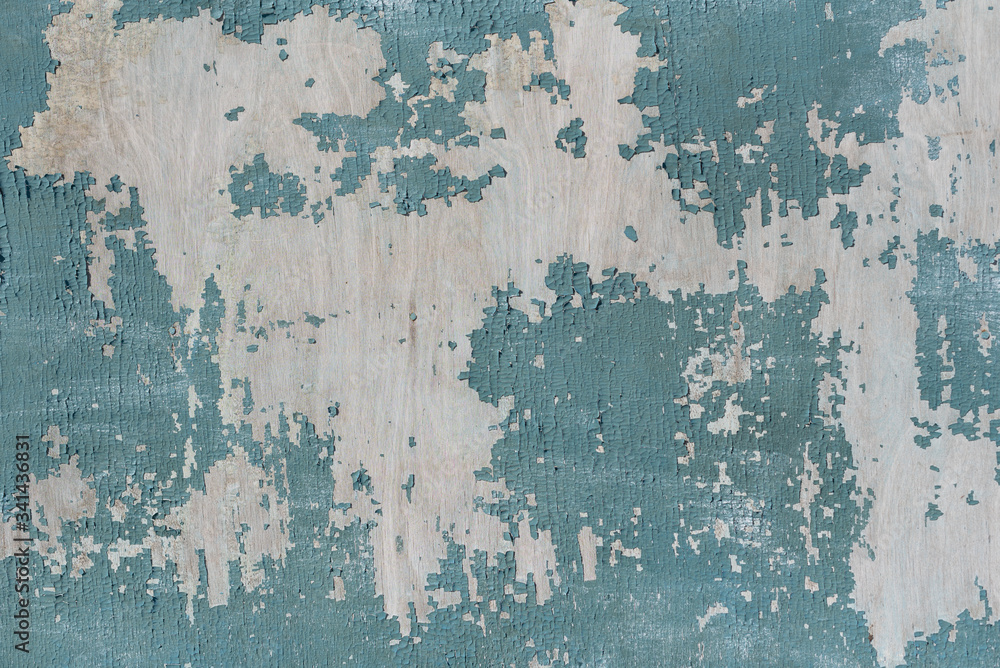 Cracked turquoise paint on old wood. background for lettering text