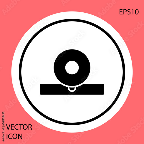 Black Otolaryngological head reflector icon isolated on red background. Equipment for inspection the patient's ear, throat and nose. White circle button. Vector Illustration