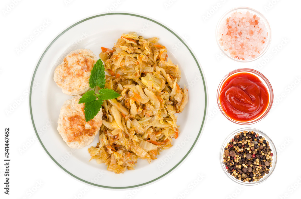 Plate with meat patties and stewed cabbage isolated on white background. Plate with meat patties and stewed cabbage isolated on white background.