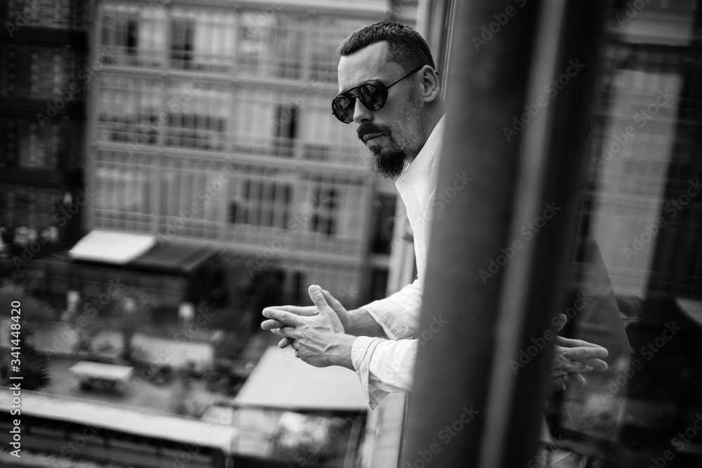 a young stylish man in an apartment in self-isolation