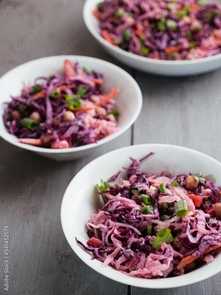 Home made vegan Red Cabbage, Chickpea Slaw with Sauerkraut, carrots and bell pepper.