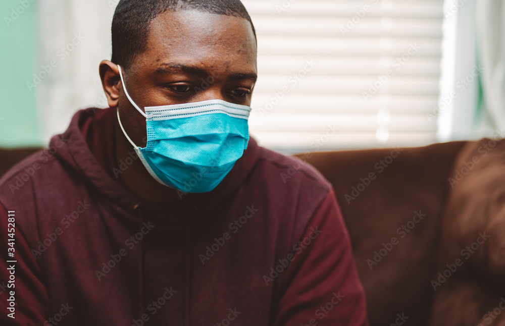 african american man in blue and white surgical face mask african american man in blue and white surgical face mask