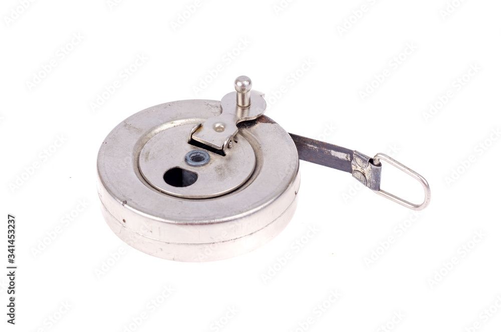 Old scratched metal tape measure, measuring on white Old scratched metal tape measure, measuring on white