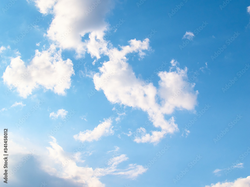 Fantastic soft white clouds against blue sky Fantastic soft white clouds against blue sky