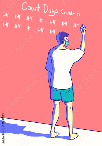 young man stay at home for social distancing and write counting day to final coronavirus covid - 19 on the wall