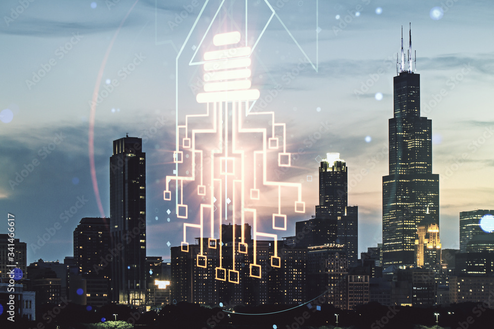 Double exposure of virtual creative light bulb hologram with chip on Chicago city skyscrapers background, idea and brainstorming concept