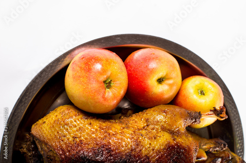 Baked duck with apples. Guck with fruits in owen
