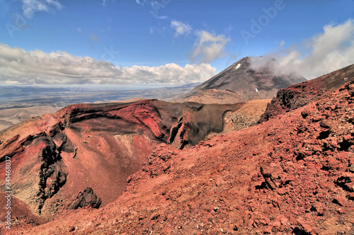 Tramping track  -  The Tongariro Alpine Crossing in Tongariro National Park  in New Zealand. photo