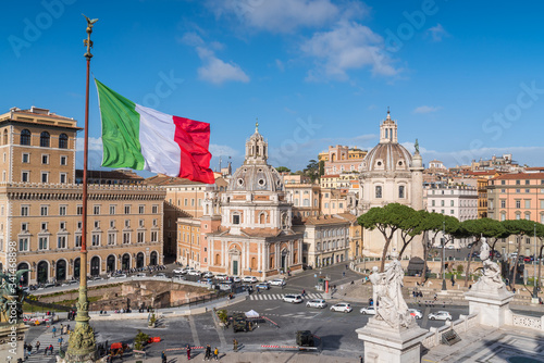 Panorama of Piazza Venezia seen from above with Italian flags