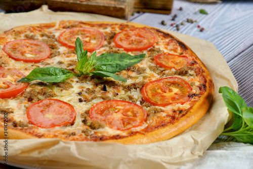 Bolognese pizza with tomatoes and minced meat