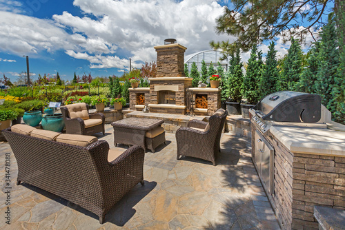 Beautiful Outdoor Living Space with Fire Place and BBQ Grill/ Outdoor Kitchen