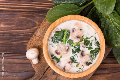 Fresh creamy champignon spinach soup