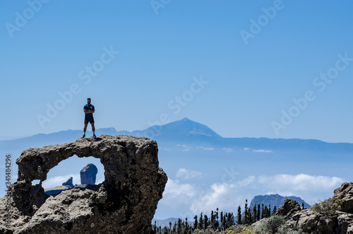man on top of the mountain