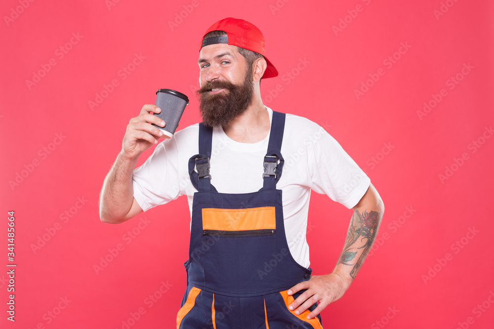 Mechanic enjoy coffee. Coffee breaks keeps you awake and alert. Handsome builder hold coffee cup. Energy concept. Caffeine addiction. Brief coffee break provides employees with quick ways to relax Mechanic enjoy coffee. Coffee breaks keeps you awake and alert. Handsome builder hold coffee cup. Energy concept. Caffeine addiction. Brief coffee break provides employees with quick ways to relax