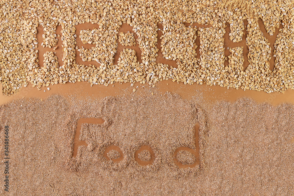 Healthy food, oat bran, oat flakes. Complex carbohydrates. Stock Photo Adobe Stock