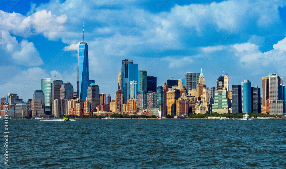 View of Manhattan Skyline, from Liberty State Park in Jersey City, New Jersey. Manhattan is the most densely populated of the five boroughs of New York City. View of Manhattan Skyline, from Liberty State Park in Jersey City, New Jersey. Manhattan is the most densely populated of the five boroughs of New York City.