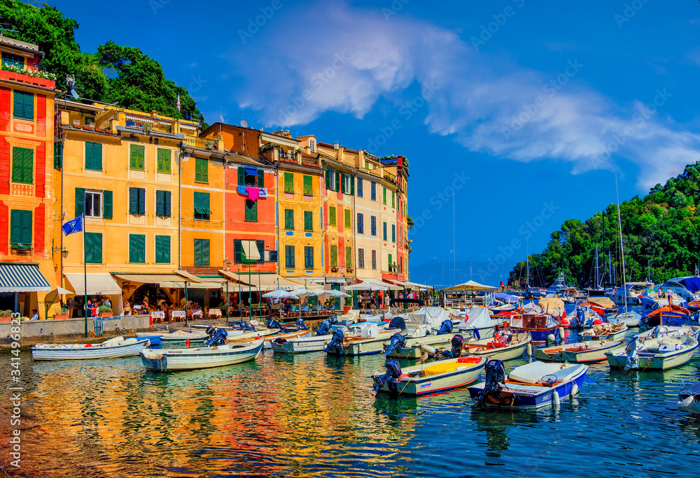 Italian city of Portifino with beautiful blue coastline and colorful buildings