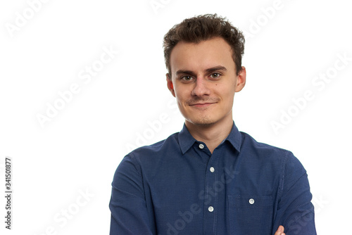 Young man with blue shirt on white
