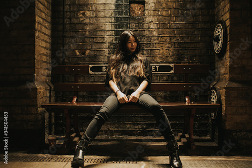 Beautiful asian woman underground train London