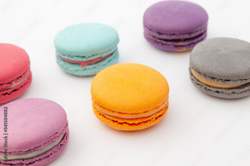 A macaroon - sweet meringue based confection. French cookies as a treat for the holiday A macaroon - sweet meringue based confection. French cookies as a treat for the holiday