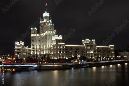 Night view of the Moscow river and high-rise on Kotelnicheskaya Embankment, Russia, Moscow
