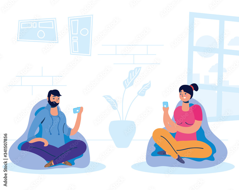 couple using smartphone in sofa couple using smartphone in sofa
