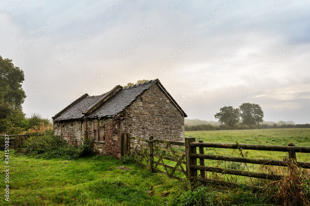 old brick barn in the countryside, Derbyshire, England.