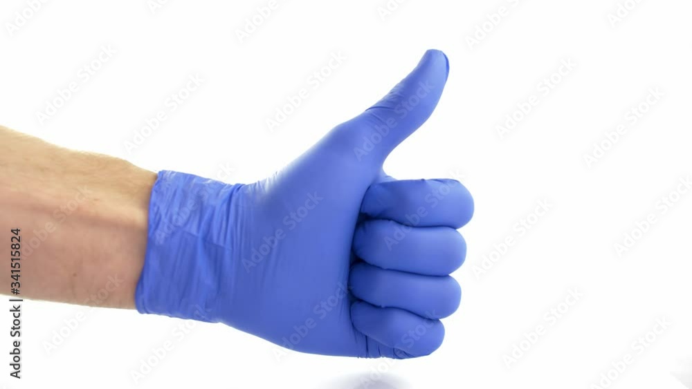 Thumbs Up Signal Shown in Blue Protective Surgical Gloves on White Background Thumbs Up Signal Shown in Blue Protective Surgical Gloves on White Background