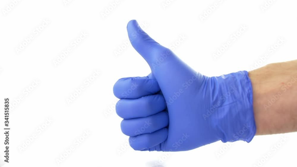 Thumbs Up Signal Shown in Blue Protective Surgical Gloves on White Background Thumbs Up Signal Shown in Blue Protective Surgical Gloves on White Background