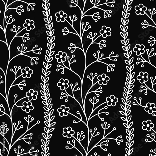 Floral pattern. Wildflowers. Seamless pattern white outline on a black background