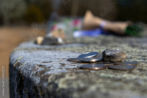 Coins on a Gravestone