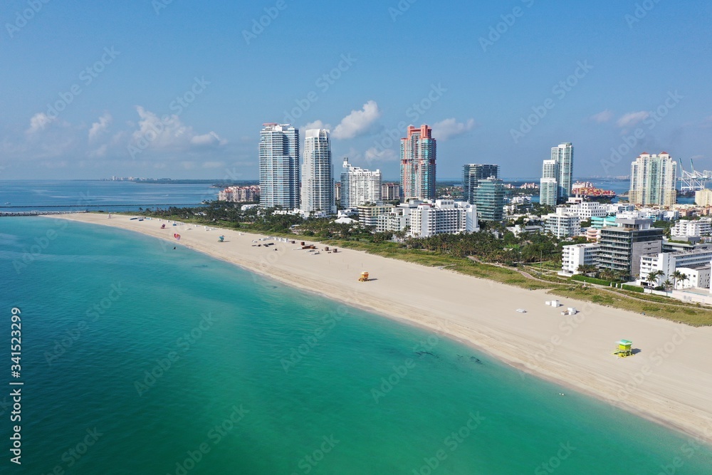 Aerial view of South Beach in Miami Beach, Florida devoid of people under coronavirus pandemic beach and park closure. Aerial view of South Beach in Miami Beach, Florida devoid of people under coronavirus pandemic beach and park closure.