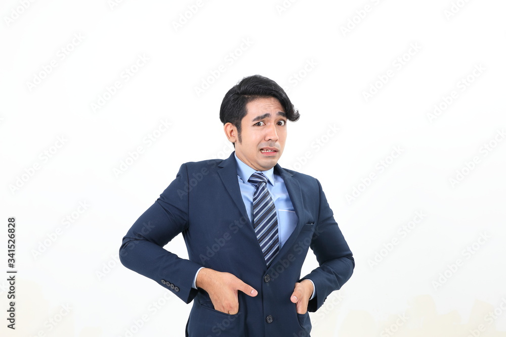 South east Asian Malay Man facial expression shocked scared afraid hand in suit pocket South east Asian Malay Man facial expression shocked scared afraid hand in suit pocket