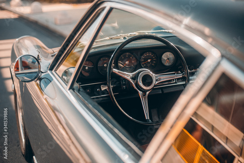 Control wheel and windows of a retro car, view through window
