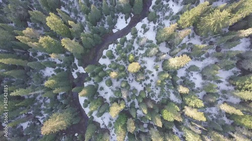 Mt Jefferson is Oregon's second tallest mountain. Mount Jefferson Wilderness Area, Oregon
Aerial view, pine forest, river and pond with snow in spring time. Start touristic season. Beautiful sunny day photo