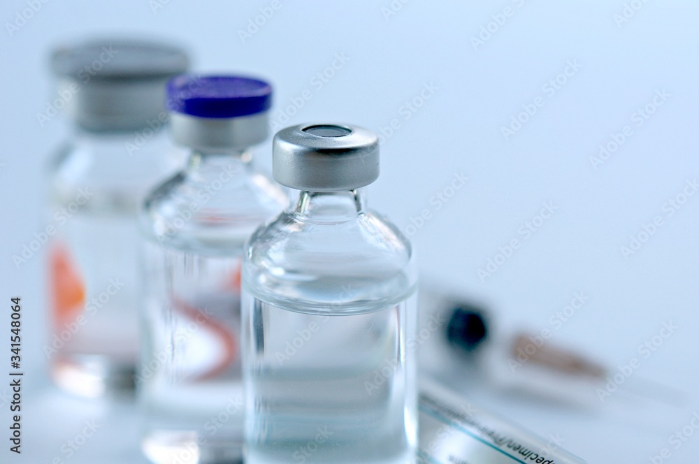 Medicine in vials , ready for vaccine injection , Cancer Treatment , Pain Treatment and can also be abused for an illegal use, healthcare and medical concept vaccination. Medicine in vials , ready for vaccine injection , Cancer Treatment , Pain Treatment and can also be abused for an illegal use, healthcare and medical concept vaccination.