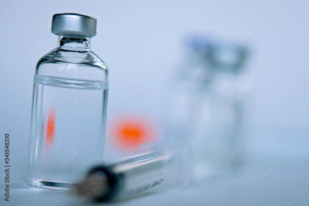 Medicine in vials and syringe , ready for vaccine injection , Cancer Treatment , Pain Treatment and can also be abused for an illegal use, healthcare and medical concept vaccination. Medicine in vials and syringe , ready for vaccine injection , Cancer Treatment , Pain Treatment and can also be abused for an illegal use, healthcare and medical concept vaccination.