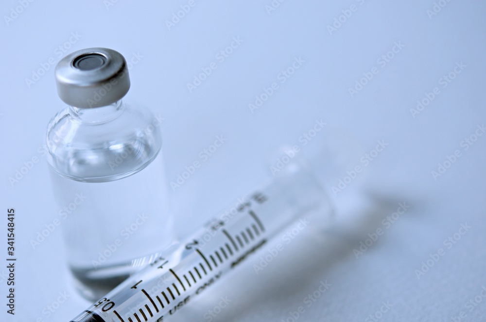 Medicine in vials and syringe , ready for vaccine injection , Cancer Treatment , Pain Treatment and can also be abused for an illegal use, healthcare and medical concept vaccination. Medicine in vials and syringe , ready for vaccine injection , Cancer Treatment , Pain Treatment and can also be abused for an illegal use, healthcare and medical concept vaccination.