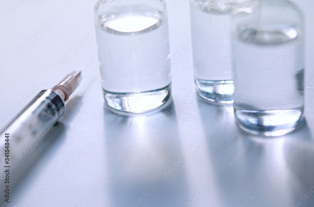 Medicine in vials and syringe , ready for vaccine injection , Cancer Treatment , Pain Treatment and can also be abused for an illegal use, healthcare and medical concept vaccination. Medicine in vials and syringe , ready for vaccine injection , Cancer Treatment , Pain Treatment and can also be abused for an illegal use, healthcare and medical concept vaccination.