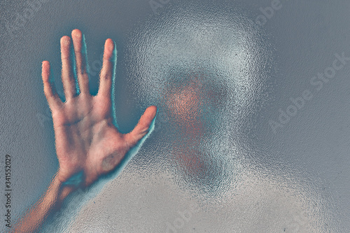 Hand on a transparent screen